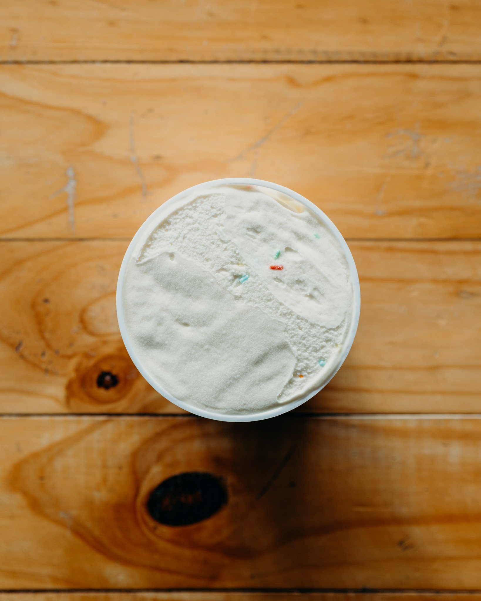 Birthday cake flavoured ice cream tub
