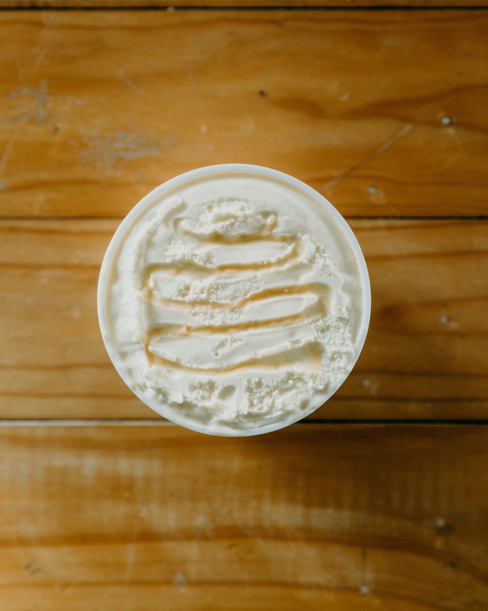 Salted caramel ribbon ice cream tub